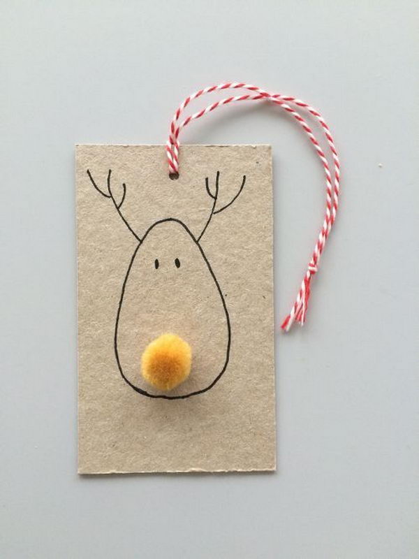 Super Simple Pom Poms Reindeer Christmas Gift Tag. 