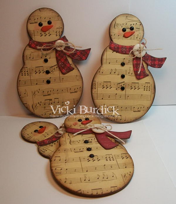 Rustic Snowmen Made Of Music Sheets. 