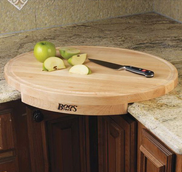 John Boos Corner Cutting Board. This oval-shaped maple wood cutting board converts a counter corner space into efficient working space. Get it at 