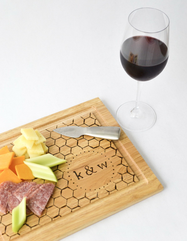 DIY Monogrammed Cutting Board. The monogrammed design of this cutting board gives a fun touch of personality. Check out the full tutorial 