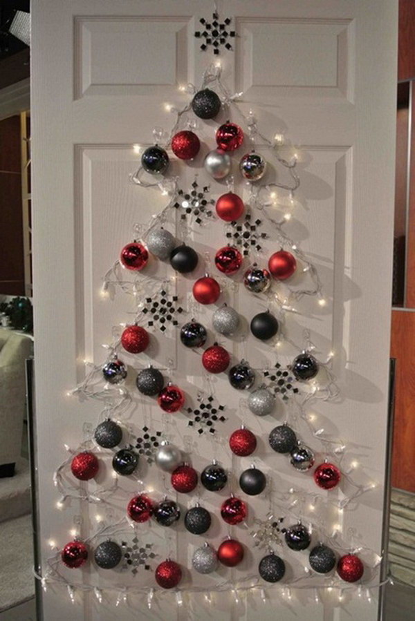 DIY Christmas Door Decoration with Ornaments and String Lights. 