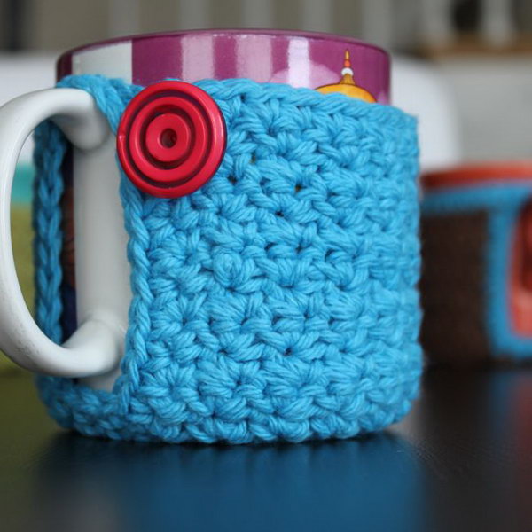 Crochet Mug Cozy. A crochet coffee cozy is a knitted piece that wraps around a coffee cup. It provides extra insulation, keeping coffee in cups warm while protecting fingers from the heat. 