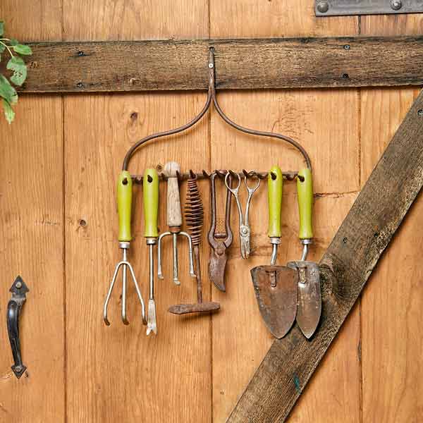 Repurpose Your Old Fork as the Storage of  Garden Tools. Get the tutorial 