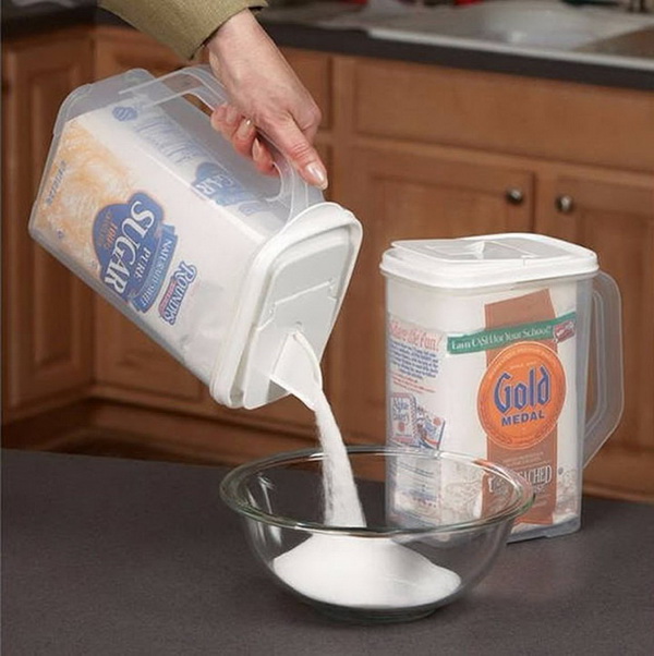 Flour and Sugar Dispenser. This is much nicer way of storing flour and sugar and easier to get them.. 