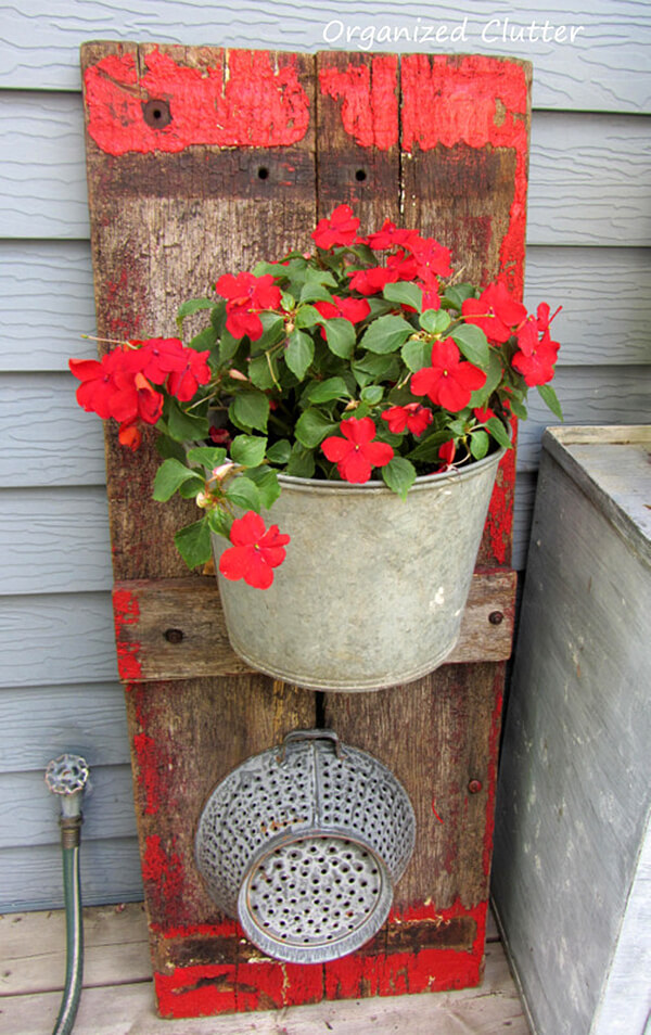 Wagon Board and Metal Bucket Planter. 