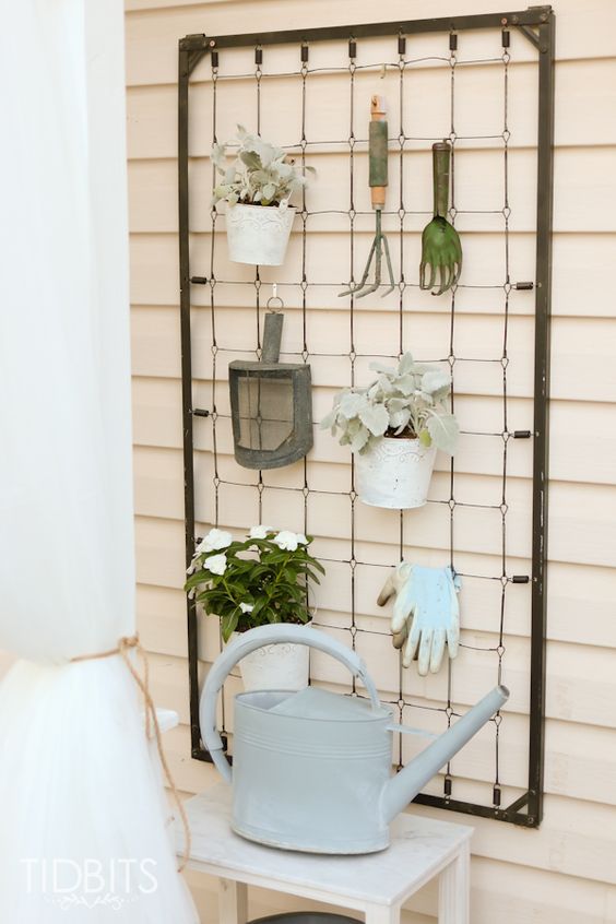 Repurposed Crib Garden Tool Hanger. 